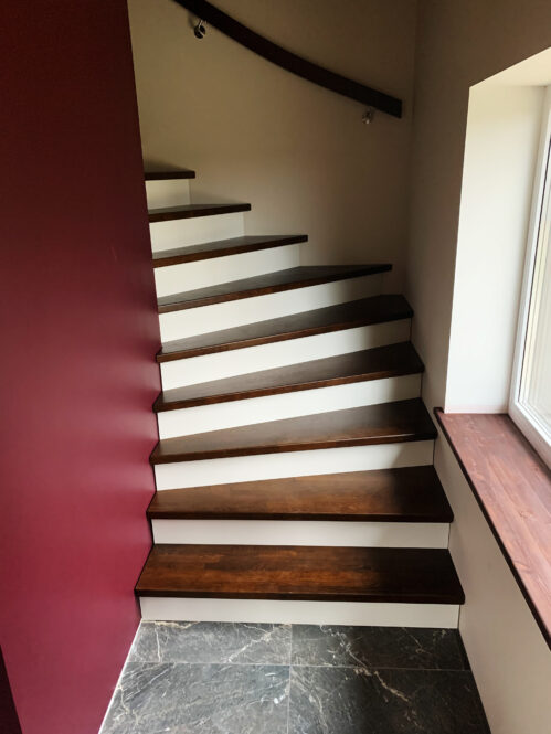 L-shaped staircase with oak steps. Material - wood.